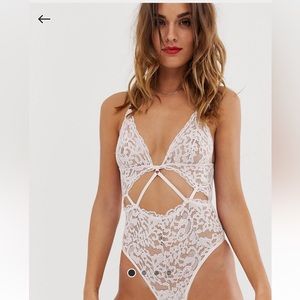 ASOS lace exposed back Strappy bodysuit in pale pink